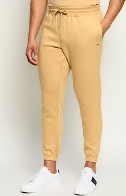 Spodnie męskie sportowe Tommy Jeans ze sklepu: Gomez Fashion Store w kategorii: Spodnie męskie - zdjęcie 874714-BD9-10338_TM265M000050ZH3