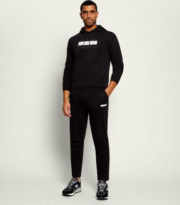 EA7 - Dres męski sportowy na jesień ze sklepu: Gomez Fashion Store w kategorii: Dresy męskie - zdjęcie 874714-BD9-10338_E7265M000131E35