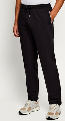 Spodnie męskie jesienne Tommy Hilfiger ze sklepu: Gomez Fashion Store w kategorii: Spodnie męskie - zdjęcie 874714-BD9-10338_TH265M000348D12