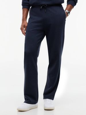 Spodnie męskie jesienne Tommy Hilfiger ze sklepu: Gomez Fashion Store w kategorii: Spodnie męskie - zdjęcie 874714-BD9-10338_TH265M00034830Q