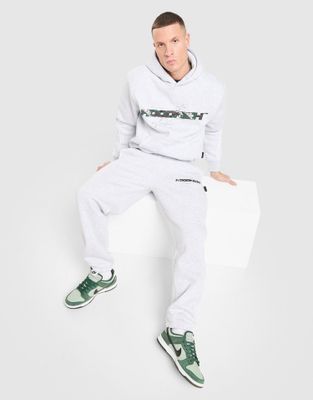 Spodnie męskie w stylu młodzieżowym Hoodrich ze sklepu: JD Sports  w kategorii: Spodnie męskie - zdjęcie 9C9C4A-9AA-13709_HR01260487