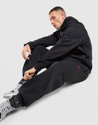 Spodnie męskie casual Jordan ze sklepu: JD Sports  w kategorii: Spodnie męskie - zdjęcie 9C9C4A-9AA-13709_IM8906-010