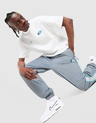 Spodnie męskie w sportowym stylu Nike ze sklepu: JD Sports  w kategorii: Spodnie męskie - zdjęcie 9C9C4A-9AA-13709_IU5691-065