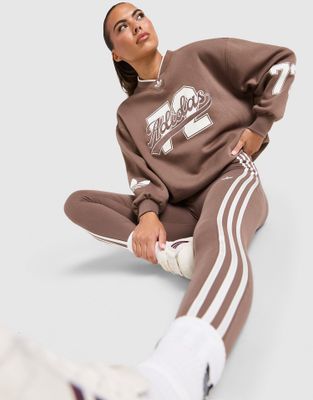 Bluza damska sportowa jesienna adidas ze sklepu: JD Sports  w kategorii: Bluzy damskie - zdjęcie 9C9C4A-9AA-13709_KY2025