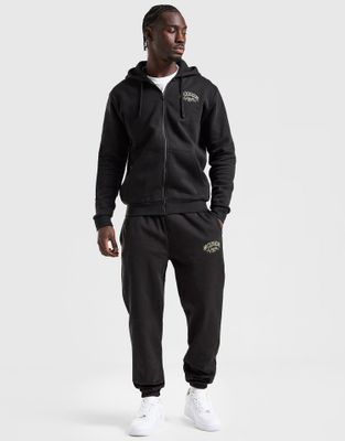 Spodnie męskie jesienne młodzieżowe Mckenzie ze sklepu: JD Sports  w kategorii: Spodnie męskie - zdjęcie 9C9C4A-9AA-13709_MCKTM16905007