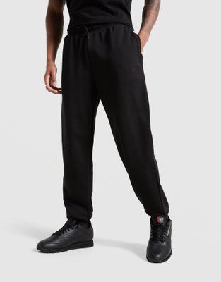 Spodnie męskie sportowe Reebok ze sklepu: JD Sports  w kategorii: Spodnie męskie - zdjęcie 9C9C4A-9AA-13709_RK25445MGM100003