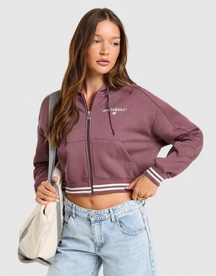 Bluza damska na jesień młodzieżowa New Balance ze sklepu: JD Sports  w kategorii: Bluzy damskie - zdjęcie 9C9C4A-9AA-13709_WJ62F3HZFTK