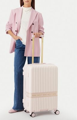 Walizka Nine West ze sklepu: eobuwie.pl w kategorii: Walizki - zdjęcie WP-EBWP-9KUZS-09B_5907964479420