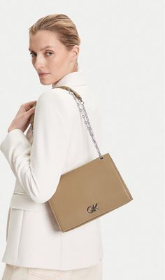 Kopertówka elegancka Calvin Klein ze sklepu: eobuwie.pl w kategorii: Kopertówki - zdjęcie WP-EBWP-9KUZS-09B_8719849128944