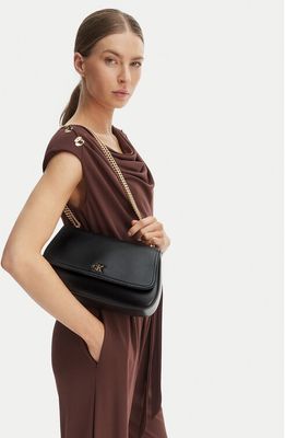 Kopertówka elegancka Calvin Klein ze sklepu: eobuwie.pl w kategorii: Kopertówki - zdjęcie WP-EBWP-9KUZS-09B_8721224841782
