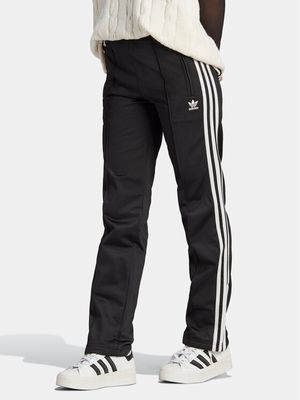 Spodnie damskie na jesień w sportowym stylu adidas ze sklepu: MODIVO w kategorii: Spodnie damskie - zdjęcie WP-EBWP-BKLVO-LN0_0000303597467