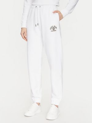 Spodnie damskie na wiosnę Guess Jeans ze sklepu: MODIVO w kategorii: Spodnie damskie - zdjęcie WP-EBWP-BKLVO-LN0_0000304594571