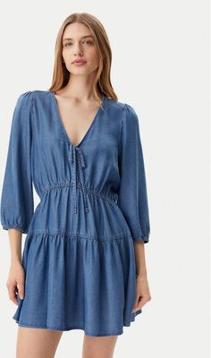 Sukienka na wiosnę casual Tommy Jeans ze sklepu: MODIVO w kategorii: Sukienki - zdjęcie WP-EBWP-BKLVO-LN0_0000304640506