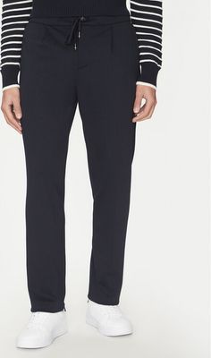 Spodnie męskie jesienne Tommy Hilfiger ze sklepu: MODIVO w kategorii: Spodnie męskie - zdjęcie WP-EBWP-BKLVO-LN0_0000304653964
