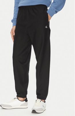 Spodnie męskie na jesień Calvin Klein Jeans ze sklepu: MODIVO w kategorii: Spodnie męskie - zdjęcie WP-EBWP-BKLVO-LN0_0000305045614
