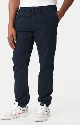 Tommy Jeans - Spodnie męskie na jesień ze sklepu: MODIVO w kategorii: Spodnie męskie - zdjęcie WP-EBWP-BKLVO-LN0_0000305568151