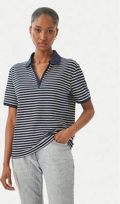 Bluzka damska na wiosnę Tommy Hilfiger ze sklepu: MODIVO w kategorii: Bluzki damskie - zdjęcie WP-EBWP-BKLVO-LN0_0000305757371
