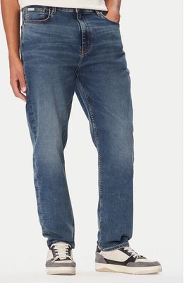 Jeansy męskie na wiosnę Guess Jeans ze sklepu: MODIVO w kategorii: Jeansy męskie - zdjęcie WP-EBWP-BKLVO-LN0_0000306246300