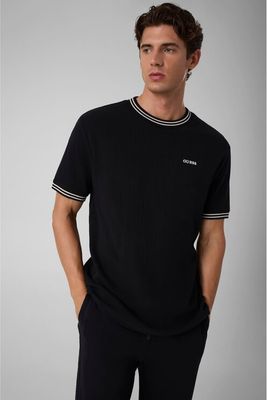 T-shirt męski na wiosnę Guess ze sklepu: MODIVO w kategorii: T-shirty męskie - zdjęcie WP-EBWP-BKLVO-LN0_0000306255432