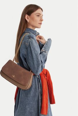 Kopertówka elegancka Calvin Klein ze sklepu: MODIVO w kategorii: Kopertówki - zdjęcie WP-EBWP-BKLVO-LN0_8721224843823